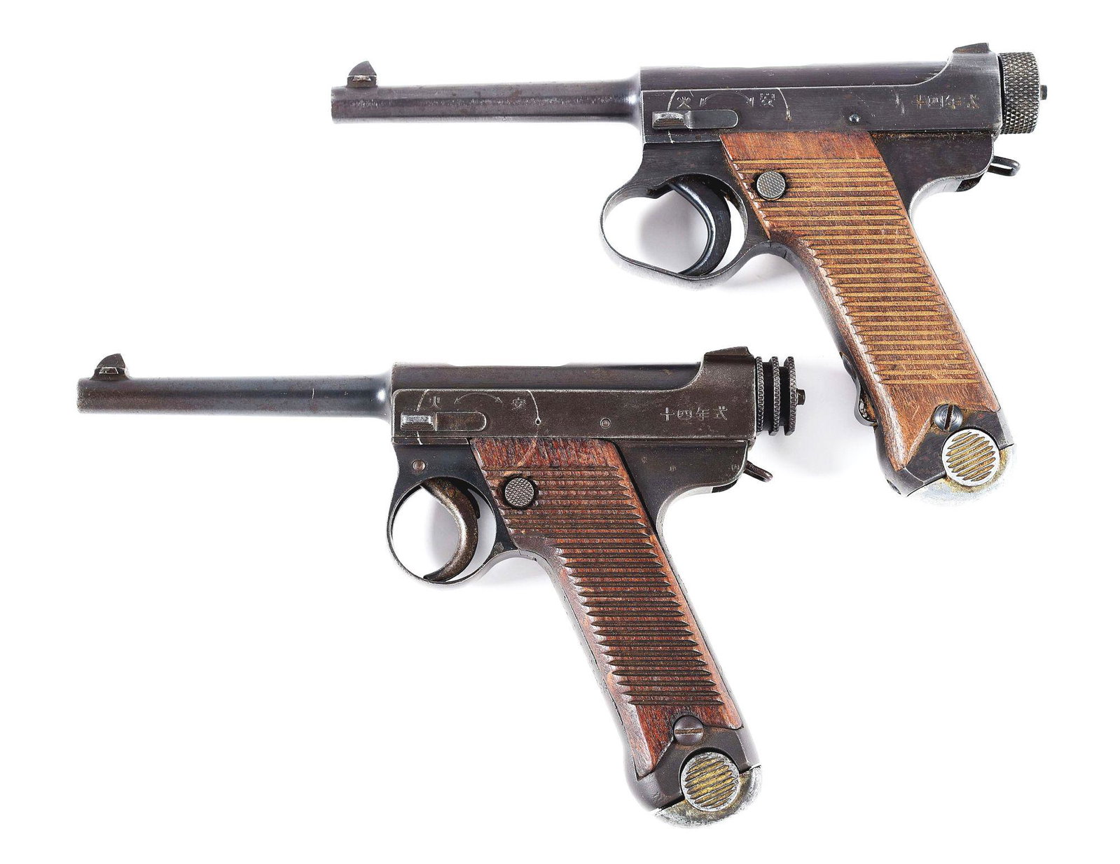 (A) LOT OF 2: WORLD WAR II JAPANESE TYPE 14 NAMBU SEMI: Gun (A) is an all matching second series Toriimatsu, including the magazine. "19.3" date code for March of 1944. All numbers are matching, including the magazine. CONDITION: Retains 90% original finis