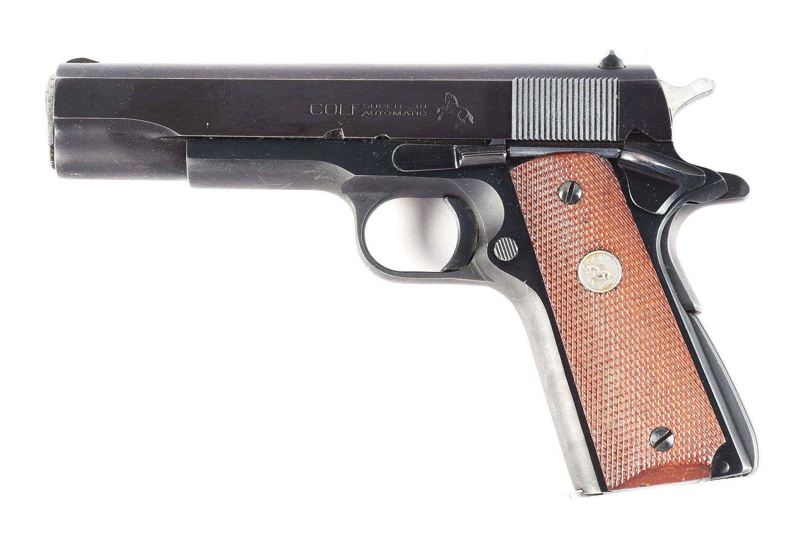 (C) COLT SUPER 38 .38 SUPER SEMI AUTOMATIC PISTOL: Manufactured 1968. Serrated slope front sight, square notch rear sight. right side with Colt patent and address in one line, left with "COLT // SUPER .38 / AUTOMATIC" with Rampant Pony adjacent. "COLT