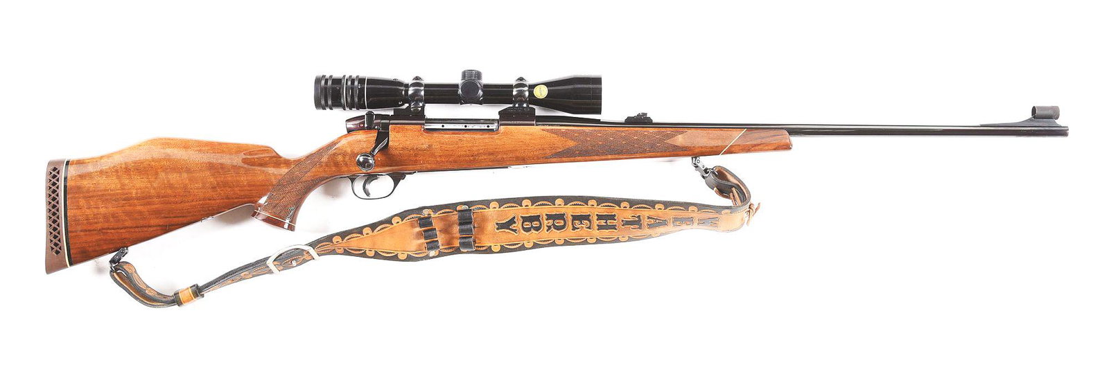 (M) GERMAN MADE WEATHERBY MARK V .300 WEATHERBY MAGNUM: Weatherby Mark V bolt action rifle with scope. Made 1964. Marked "MADE IN W-GERMANY" on the right side of the barrel. Round steel barrel with hooded blade front sight and flip up u-notch rear. High gl