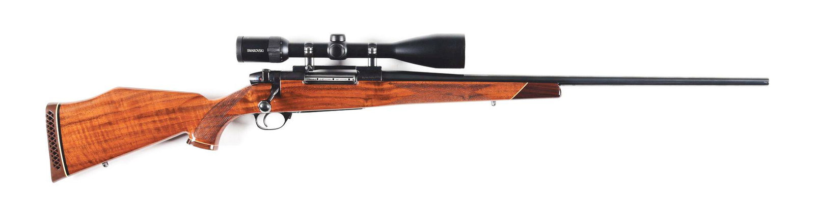 (M) WEATHERBY MARK 5 .300 WEATHERBY MAGNUM BOLT ACTION: Nine lug magnum action chambered in .300 Weatherby Magnum. Standard Weatherby stock with skipline pressed checkering, pistol grip, rollover Monte carlo cheekpiece, Weatherby basketweave recoil pad. Mo