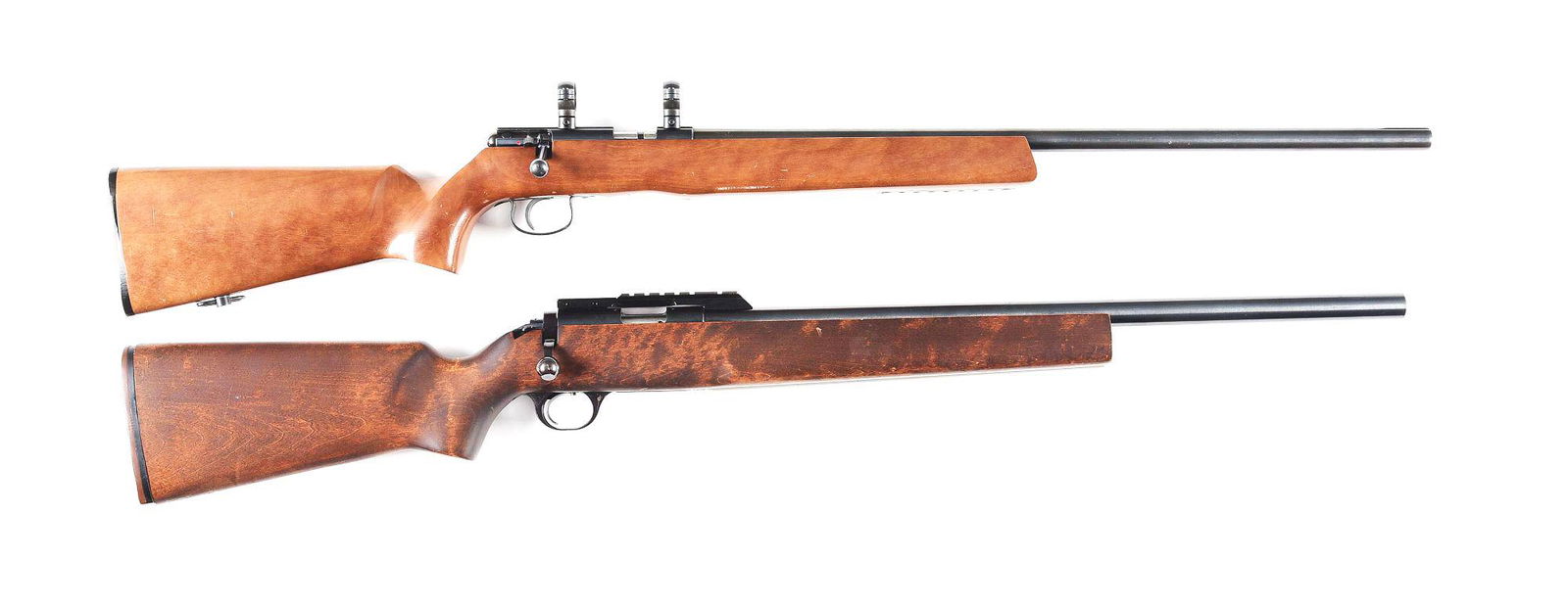 (M) LOT OF 2: SAVAGE ANSCHUTZ MARK 10-B AND H&R M-12: A) Savage Anschutz Mark 10-B bench, target rifle. Single shot bolt action. 26-inch heavy round barrel. Chambered in .22 long rifle. One-piece maple stock and forearm. CONDITION: Excellent overall with