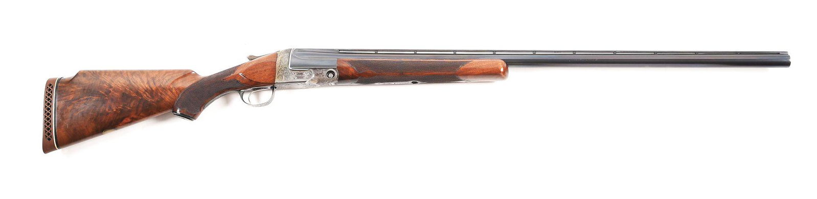 (C) PARKER SC 12 GAUGE SINGLE SHOT SHOTGUN.: Parker "SC" Grade single barrel trap built in 1931. Acme steel barrel with ventilated rib and twin bead sight and ejector. Case hardened engraved hammerless action with no safety. Walnut checkered Mon