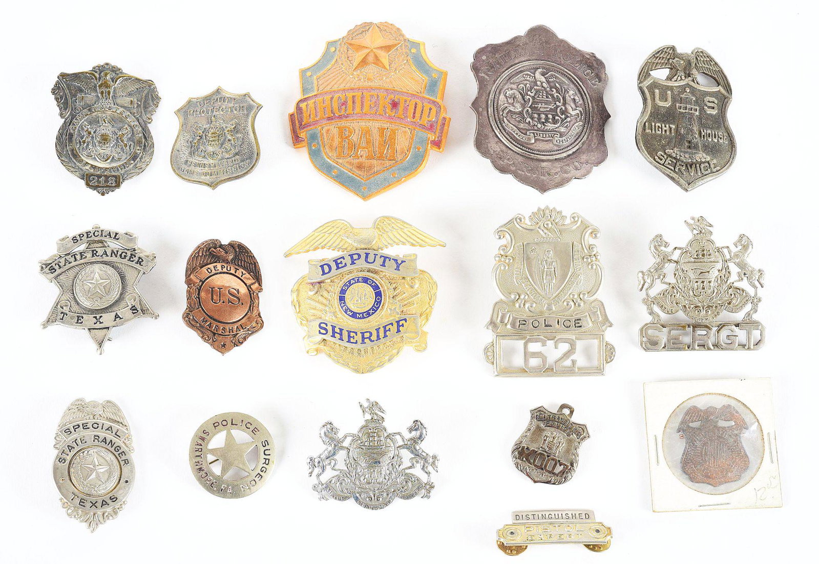 LOT OF 16: POLICE BADGES.: Lot consists of: (A) Railway Police P.R.R. Co, reverse hallmarked "F.G. Glover Co.". (B) Deputy Protector Pennsylvania Game Commission, numbered on the reverse. (C) Police Surgeon Swarthmore, Pa. (D) 