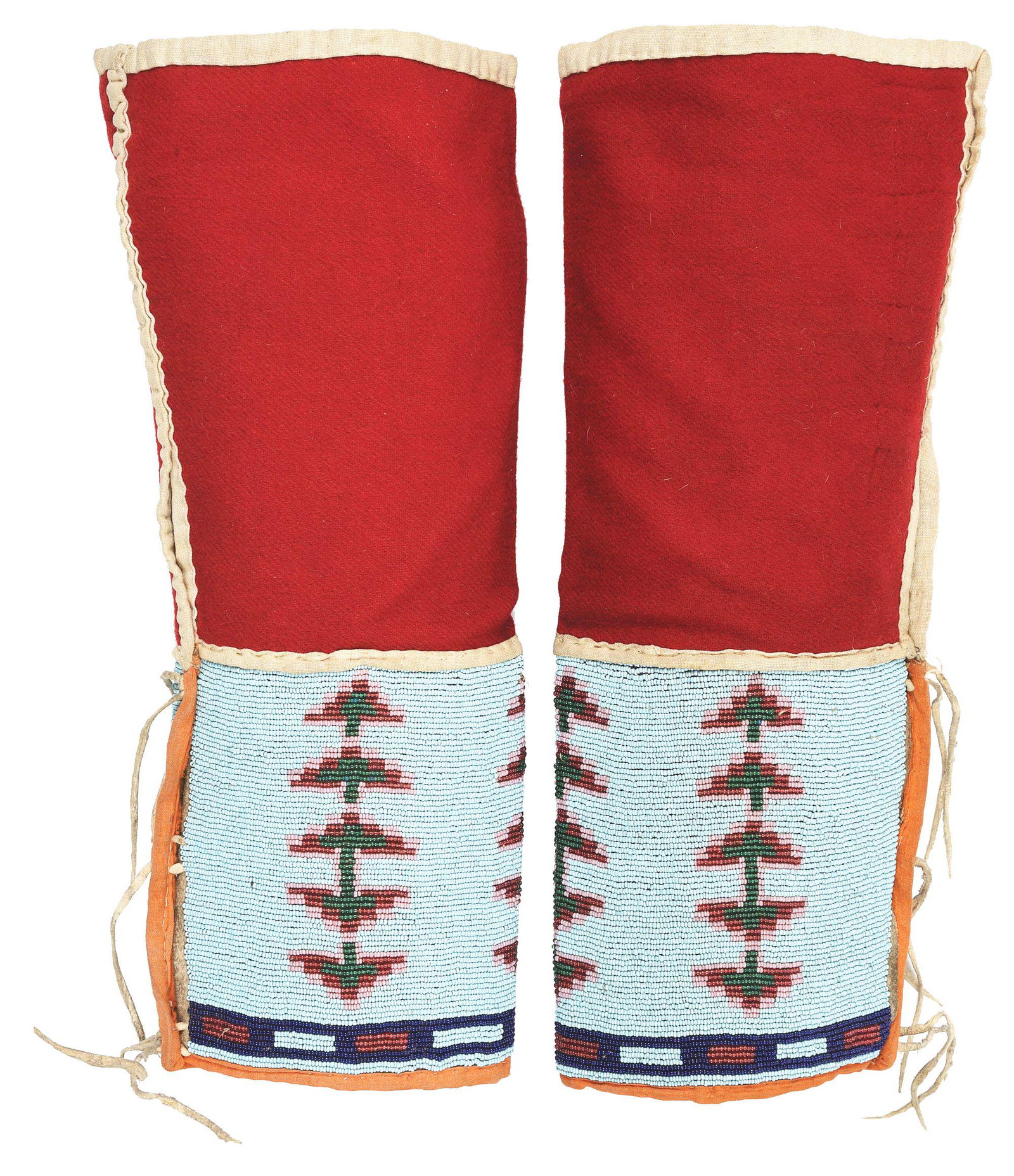 PAIR OF BEADED LEGGINGS.: 15-1/4" tall and 6" wide. Circa last quarter of the 19th Century. Northern beaded leggings beaded on Native tan hide and attached to red wool trade cloth. Minor bead loss. Sinew sewn. CONDITION: Very 