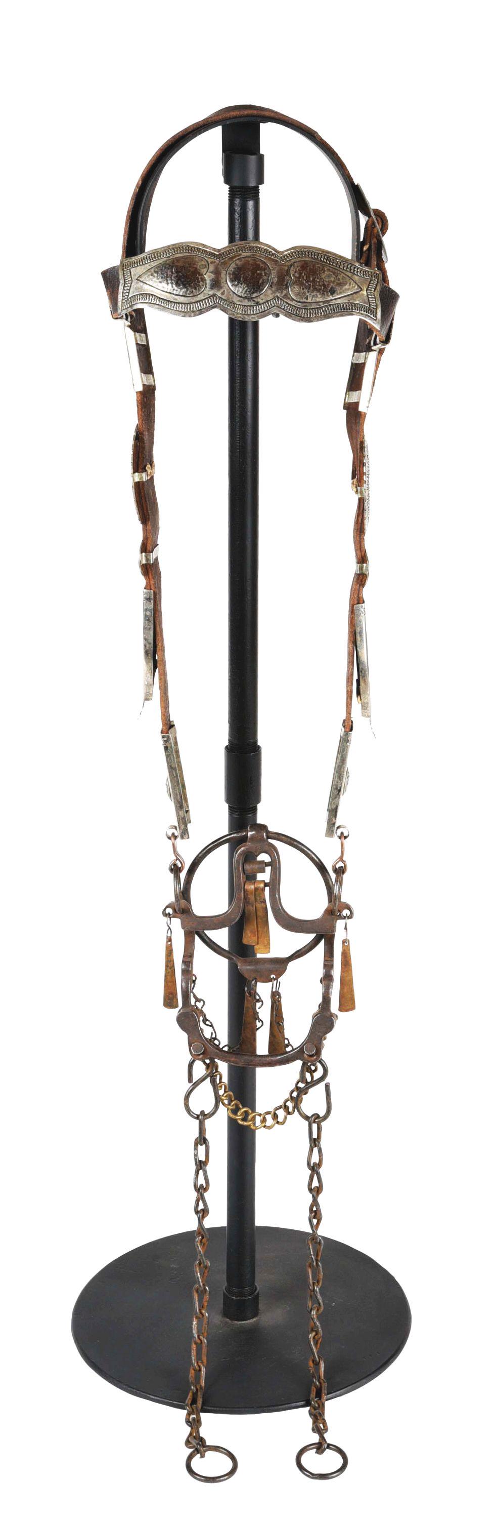 MEXICAN SILVER OVERLAYED HEAD STALL WITH RING BIT.: Seven pieces of Mexican silver overlay with four silver conchos. Extremely finely made. Slobber chains and reign chains, ring bit with four crickets. Bit has brass dingle bobs. CONDITION: Shows wear. 