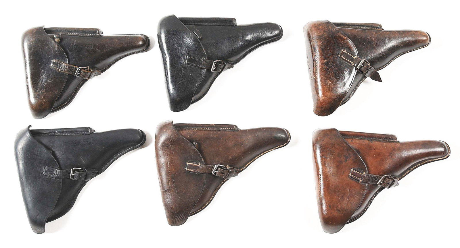 LOT OF SIX LUGER HOLSTERS: Lot consists of: A) Reverse marked " Karl Barth Waldbrol 1938" with waffenamt proof. CONDITION: Very good with tight seams, no crazing but wear to the black finish. B) Reverse marked "Wihl Brand Heide