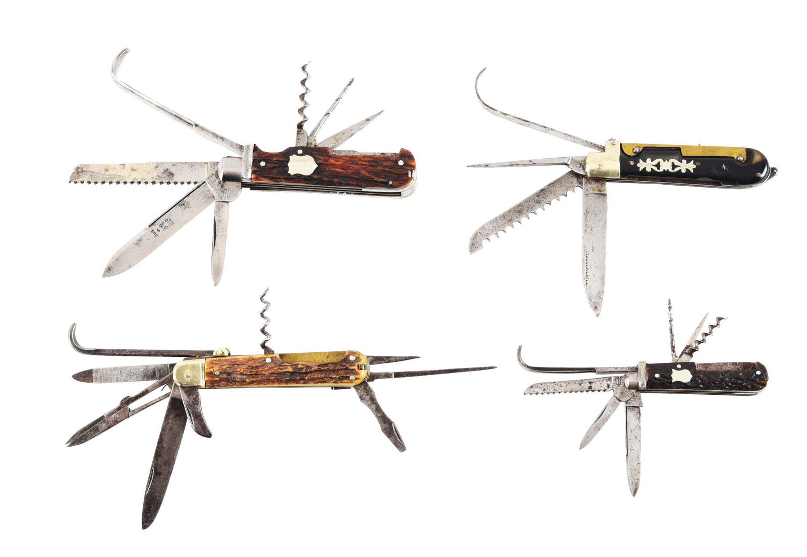LOT OF 4: EARLY FARRIER KNIVES BY WOSTENHOLM, HENCKELS,: (A) IXL George Wostenholm Sheffield. 4 - 1/4" seven blade plus pull tools farrier's knife circa pre 1890. Handled in genuine stag. Front scale is perfect, back scale has small chip by pull tool. All b