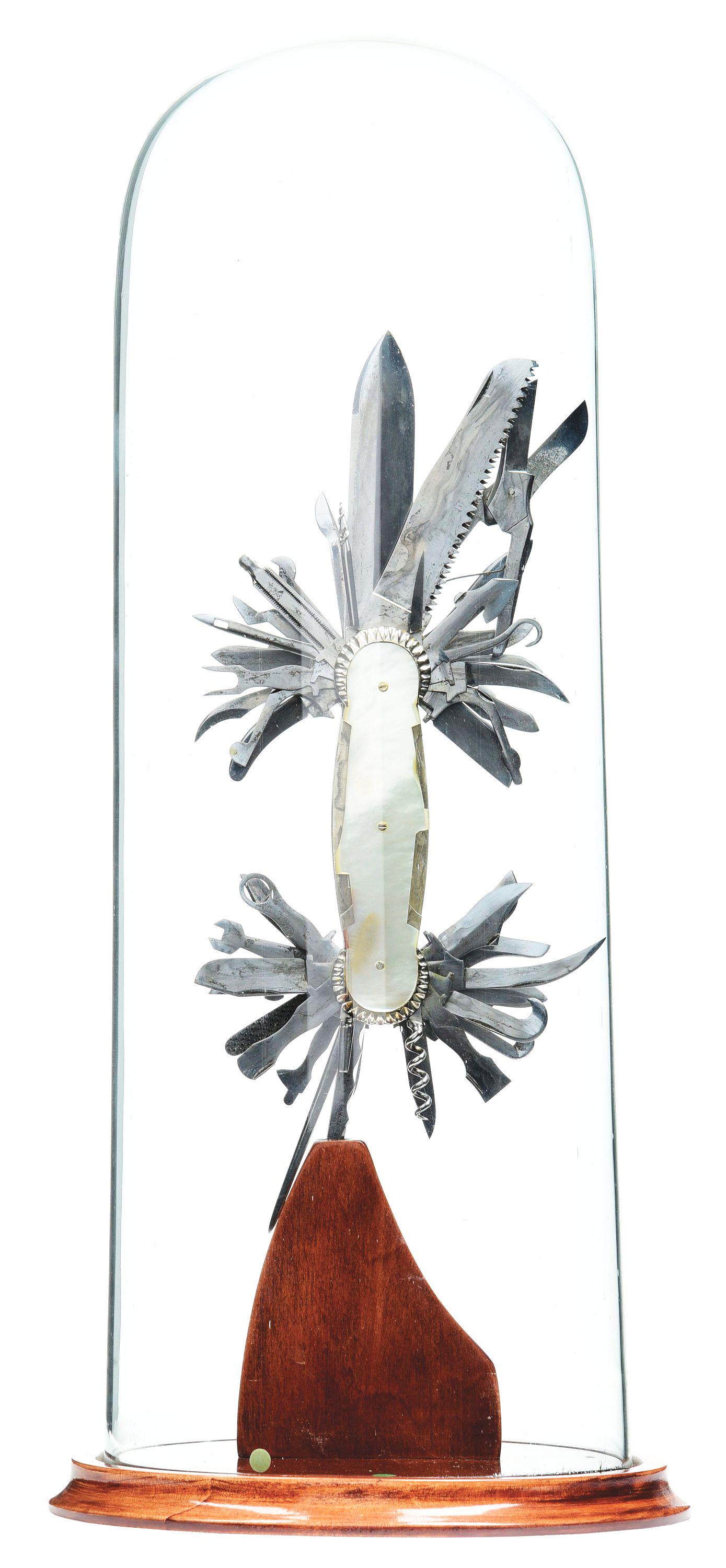 FABULOUS 50 BLADE SHOWPIECE FOLDING KNIFE, MAKER'S MARK: Fabulous 50- blade showpiece folding knife, maker's mark crossed letters P & J in a mushroom. Julius Pitz Sohne. Mother of pearl swell center scales with three screws per side, not pins, holding on fr