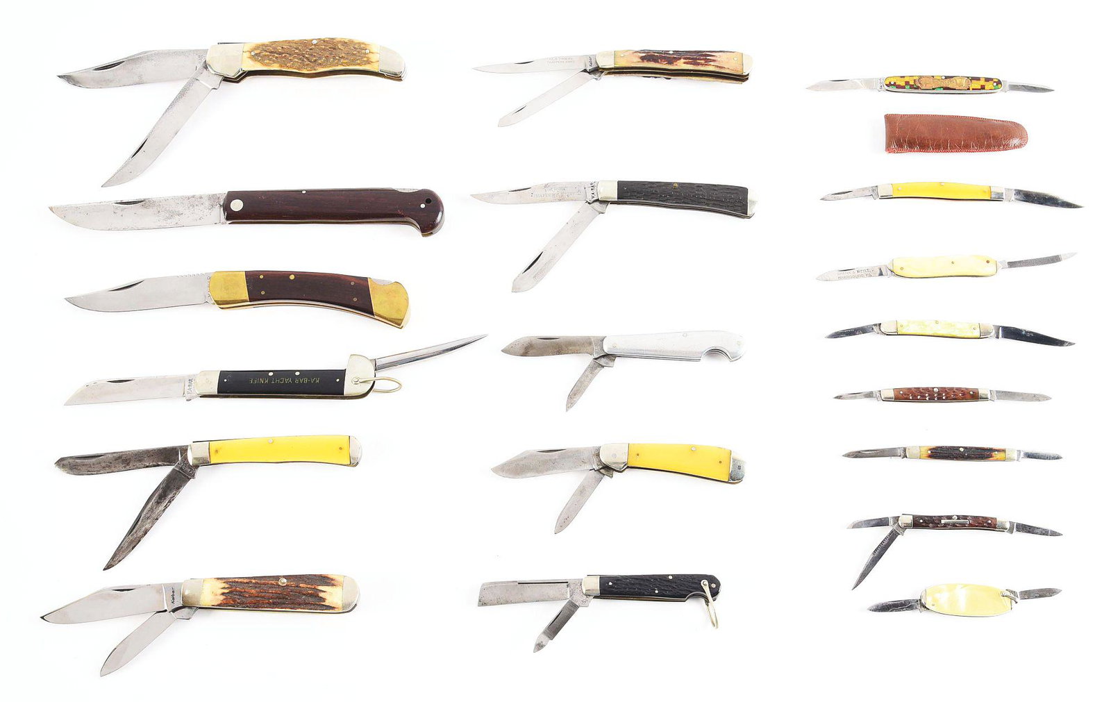 LOT OF 19: KA-BAR 1 AND 2 BLADE PATTERNS.: Highlights include; (A) KA-BAR OLEAN NY. 5 - 1/4" two blade folding hunter handled in stag. Excellent condition. (G) Kabar 4 - 1/8" two blade mint and etched trapper handled in stag. (F) Kabar 4 - 1/8