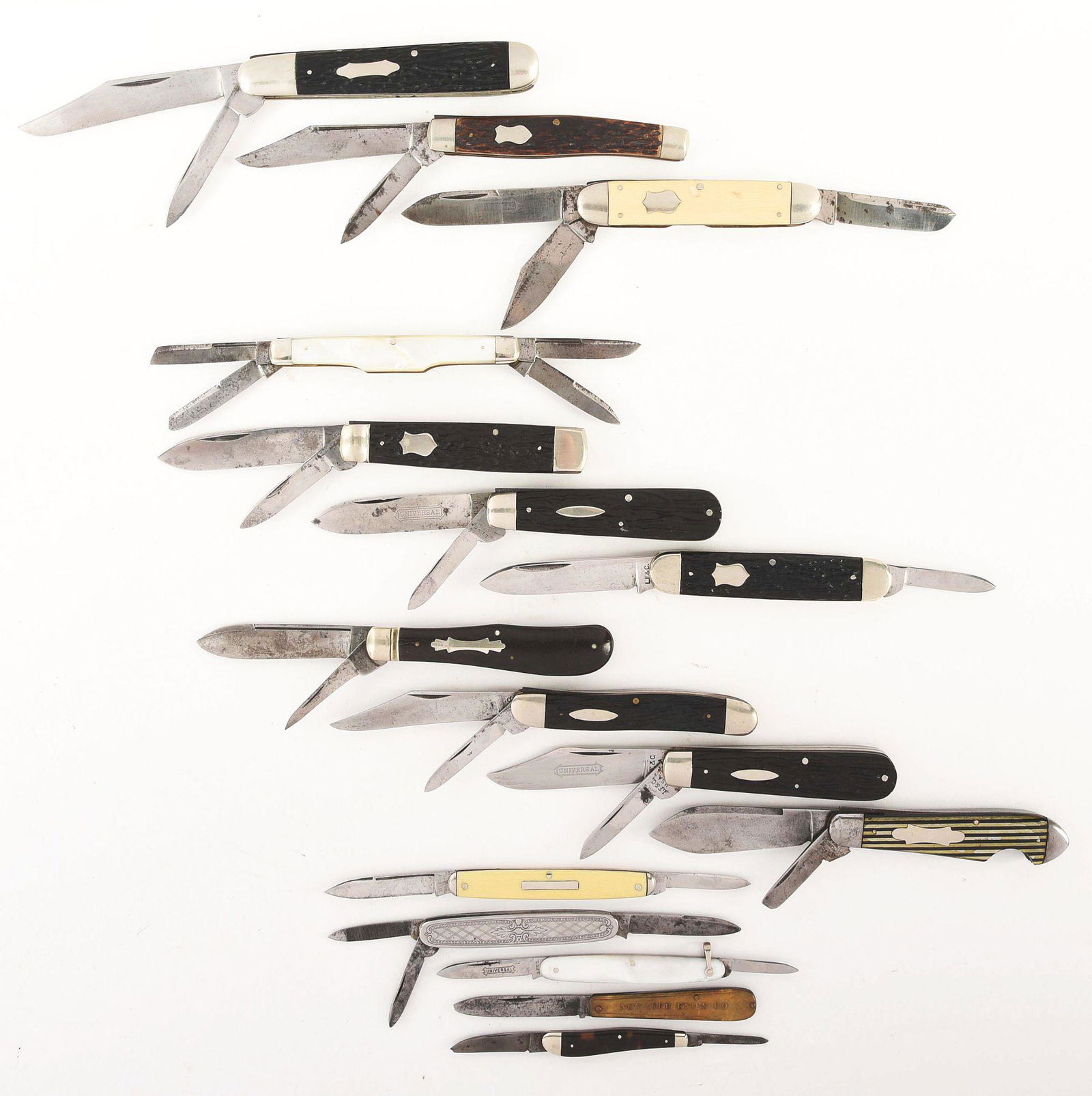 LOT OF 16: AMERICAN EARLY FOLDERS.: Lot includes knives by makers; UTICA, LANDERS FRARY AND CLARK, NYK. Largest knife is a LANDERS FRARY AND CLARK 4 - 1/2" two blade English jack. Handled in imitation stag, condition excellent. Lot also