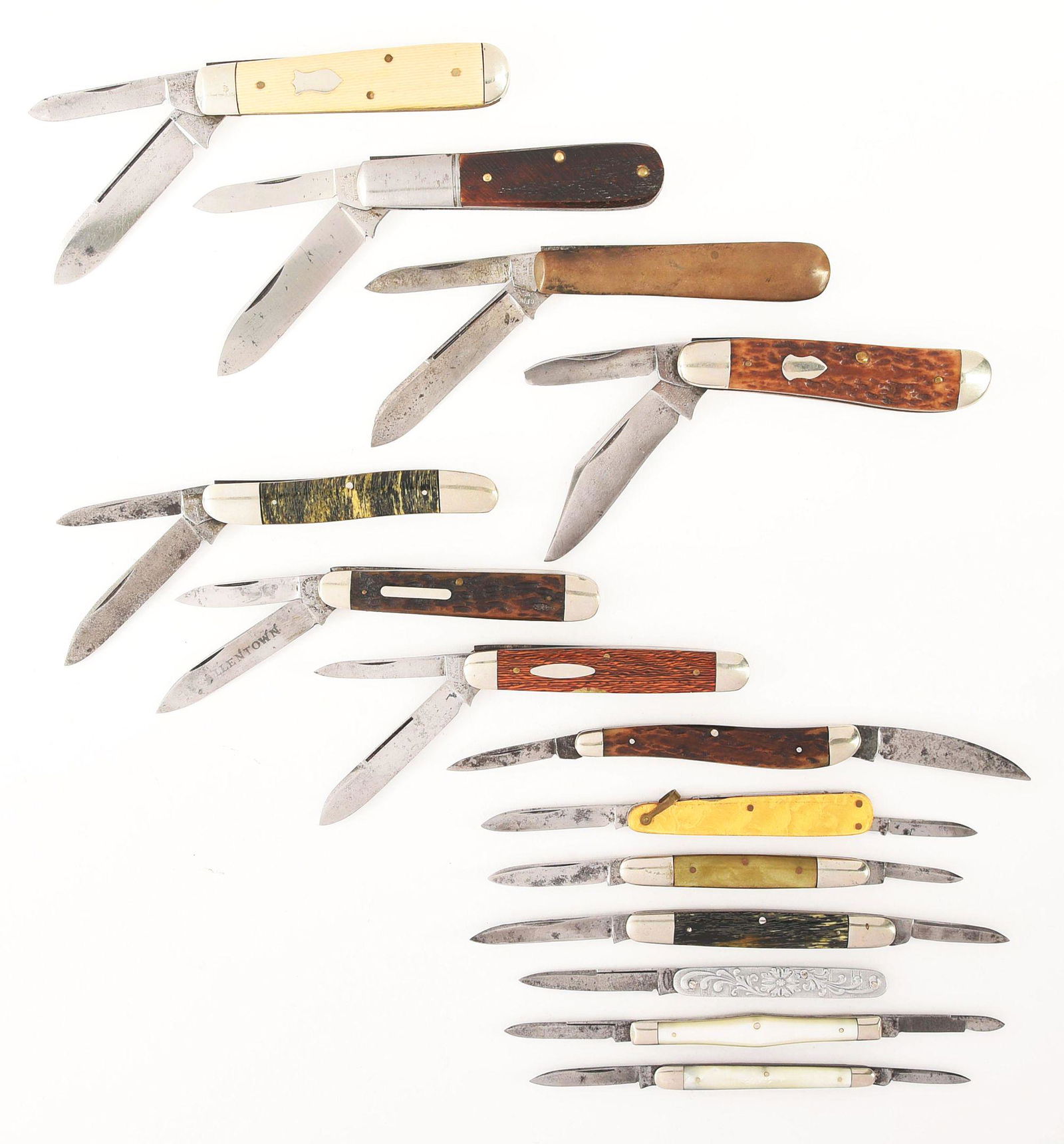 LOT OF 14: EARLY CATTARAUGUS AND C.F. WOLFERTZ FOLDING: Lot consists of: A) C.F. WOLFERTZ ALLENTOWN PA 3 - 1/2" two blade standard jack knife handled in ivory shell celluloid. CONDITION: Very good. B) C.F. WOLFERTZ & CO. ALLENTOWN PA. 3 - 3/8" two blade ba