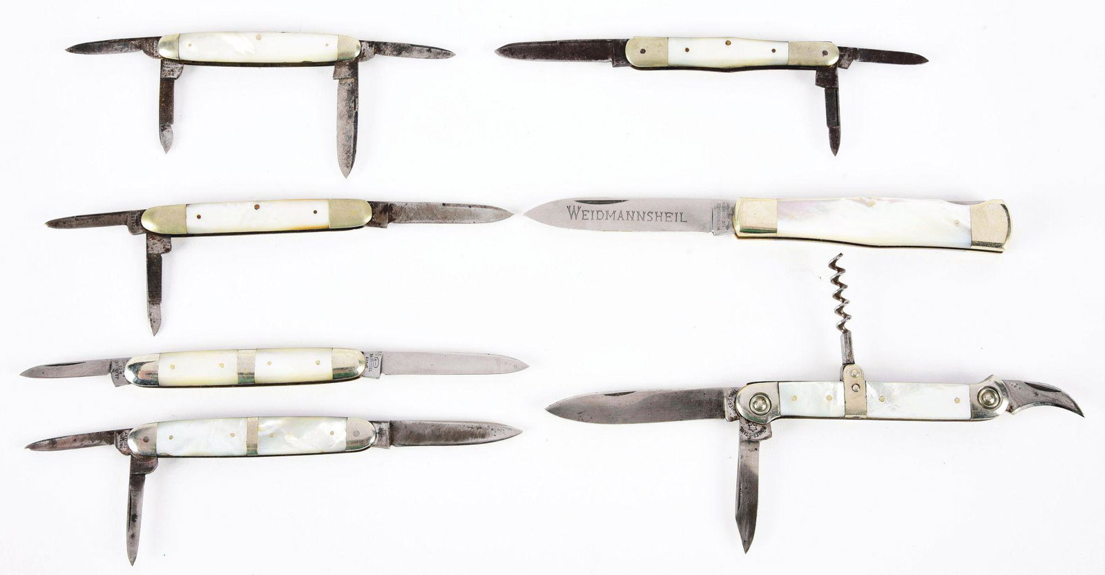 LOT OF 7: ORIGINAL VINTAGE MOTHER OF PEARL FOLDING: Lot consists of: (A) IXL GEORGE WOSTENHOLM SCHEFIELD ENGLAND 3" 4-blade senator pen knife. CONDITION: Very good to excellent. (B) HOWARD BROS GERMANY 3-5/16" 3-blade whittler. CONDITION: Very good. (C