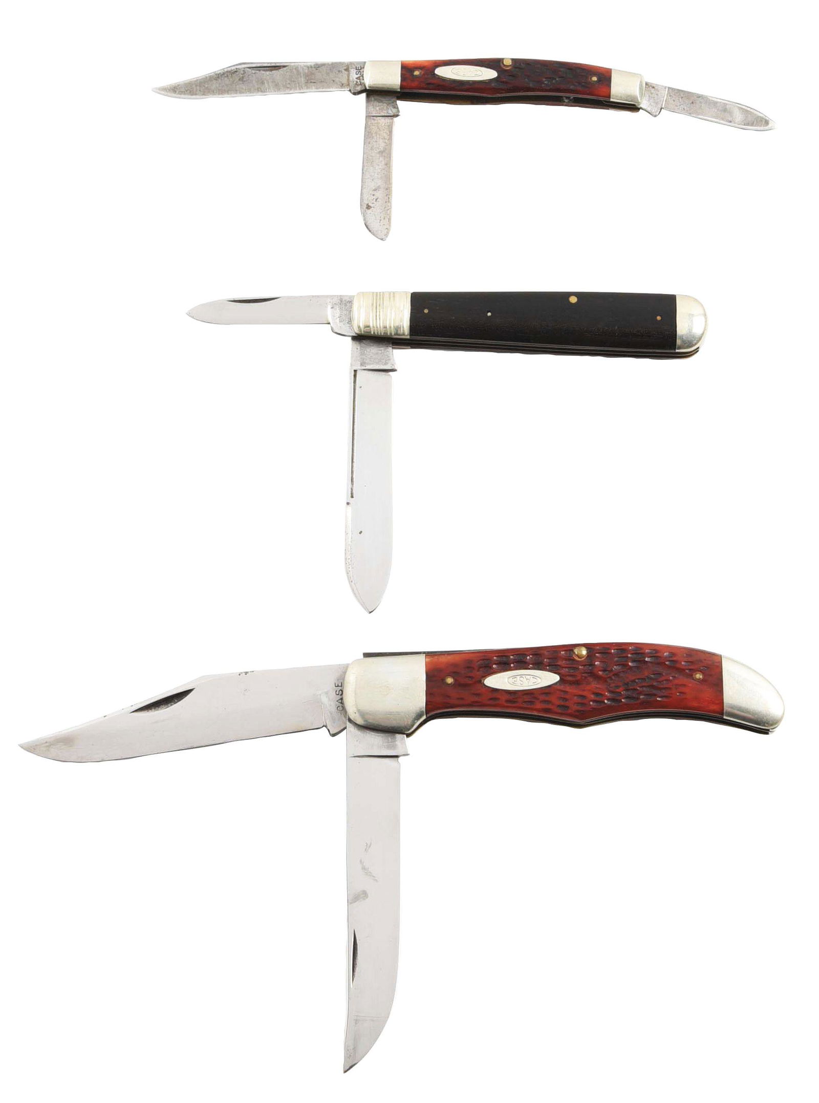 LOT OF 3: ORIGINAL VINTAGE AMERICAN FOLDING KNIVES BY: Lot consists of: (A) CASE XX 1940-1964 3-5/8" 3-blade stockman pattern number 6332 handled in red bone. CONDITION: Good to very good. (B) WINCHESTER TRADEMARK MADE IN USA circa 1920s. Both blades stam