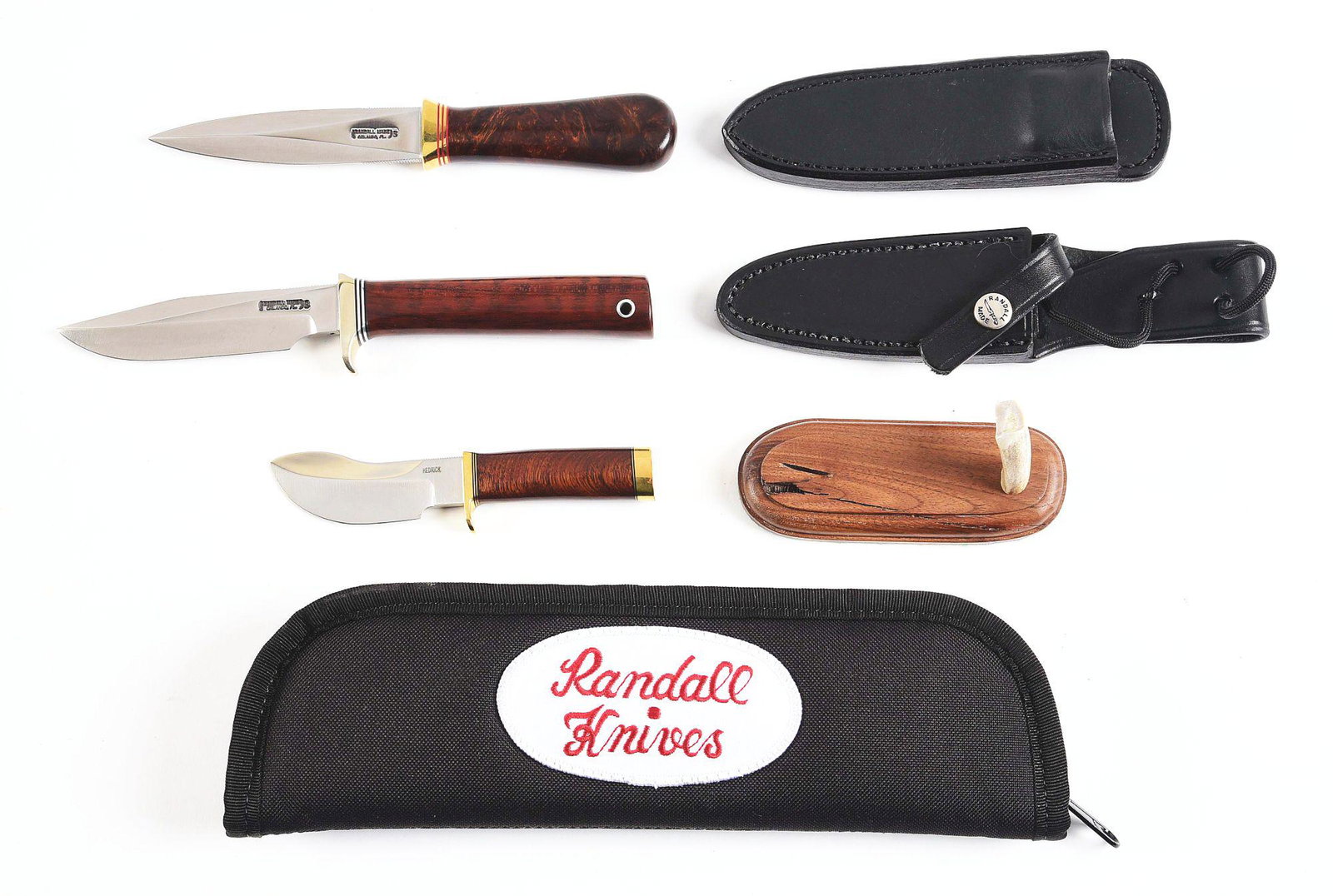 LOT OF 3: RANDALL 5-4, RANDALL GAMBLER, AND DON HEDRICK: (A) Randall Model 24 Guardian stiletto. 4" double edged dirk with stainless steel blade brass guard and Indian rosewood handle. Comes in original black leather Randall Boot sheath. CONDITION: As new. 