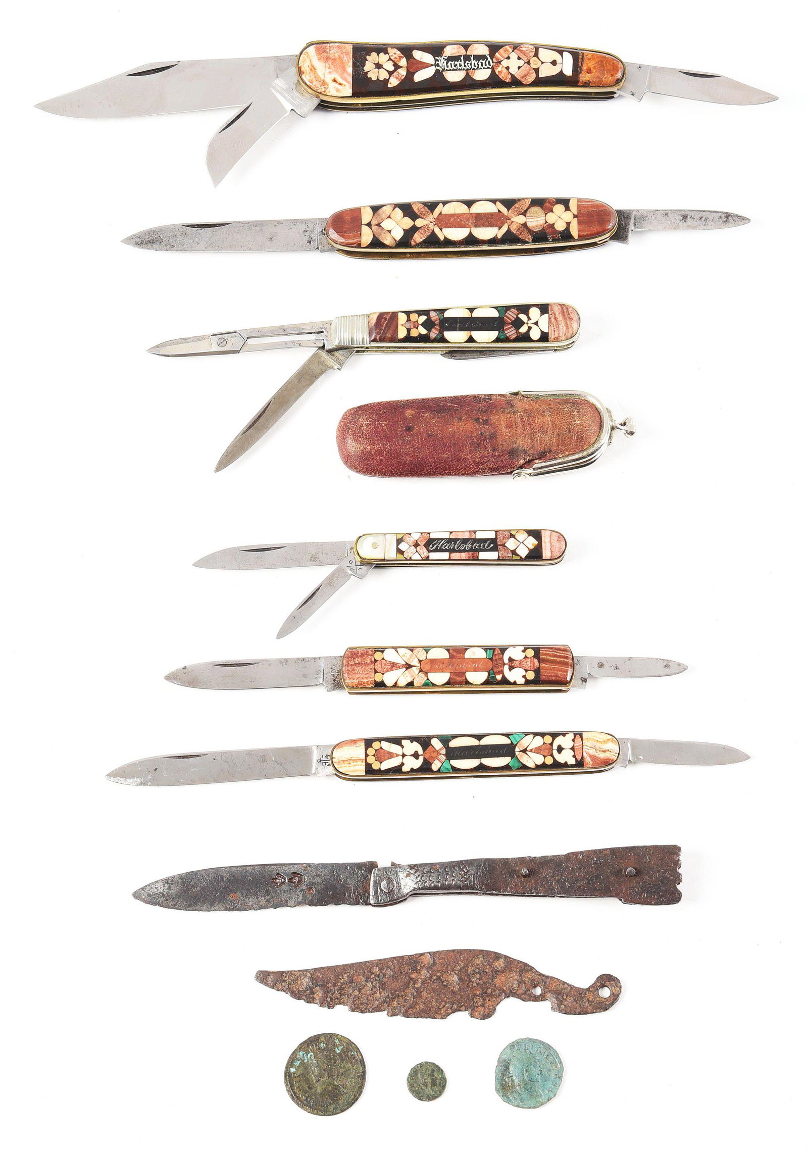 LOT OF 8: KARLSBAD SOUVENIR FOLDING KNIVES WITH FANCY: There are 6 KARLSBAD souvenir folding knives with fancy inlayed handles. Ranging from a 4" 3-blade folding knife to a 2-1/2" 2-blade folding knife. 1 knife (C) includes a leather knife purse. CONDITIO