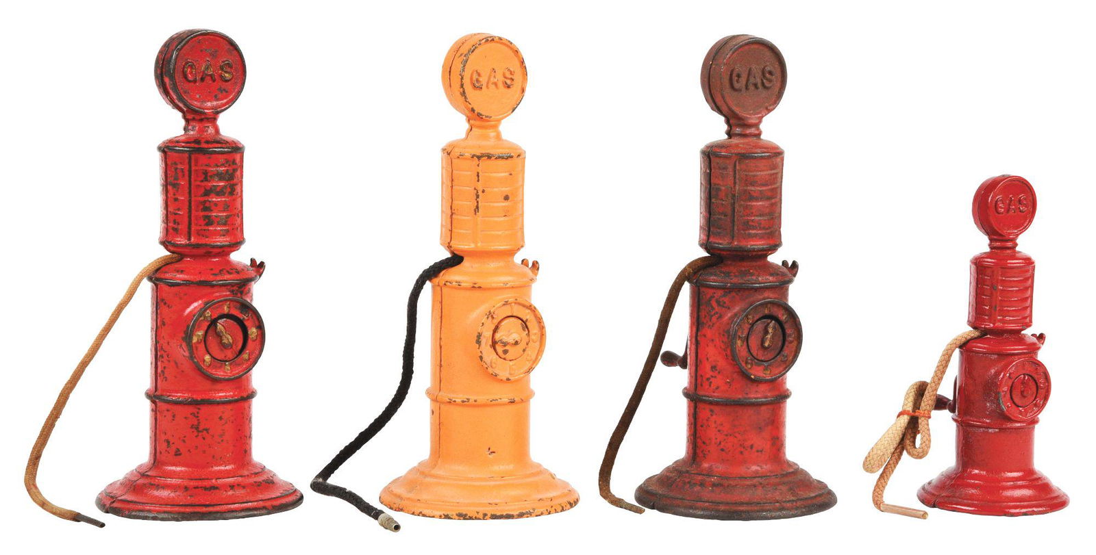 LOT OF 4: CAST-IRON ARCADE TOY GAS PUMPS. (1 of 2)