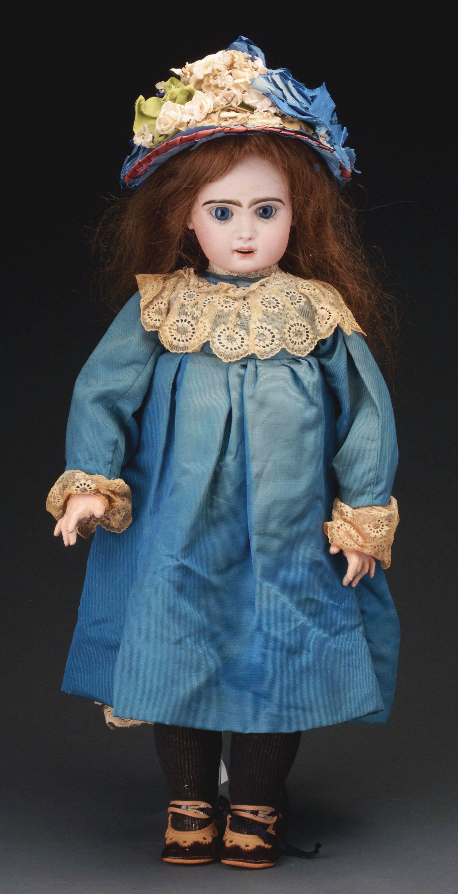 ATTRACTIVE OPEN MOUTH FRENCH BISQUE DOLL.: This 26" (66cm) bisque socket head doll is incised simply "11", however, she is undoubtedly of Jumeau manufacture, perhaps at the very start of the SFBJ period. She has an open mouth with six almost s