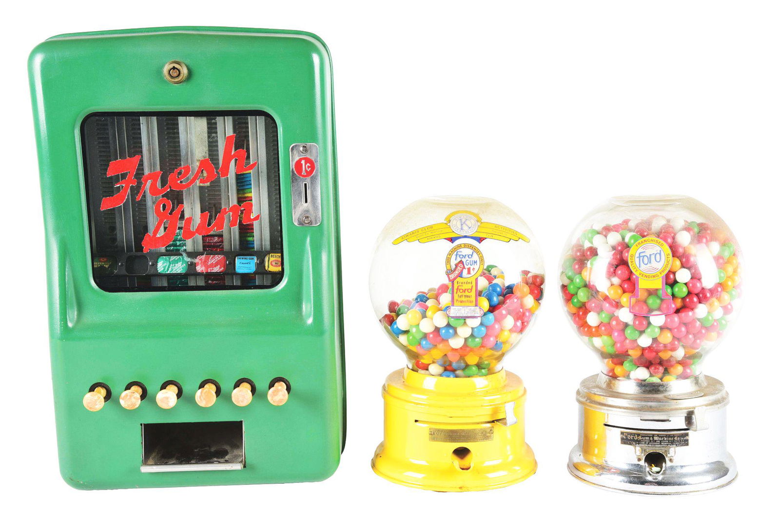 LOT OF 3: GUM VENDING MACHINES.: This is a lot of three gum vending machines. First is a Ford gum ball in new yellow paint, with original globe and decals; the second is a Ford gum vending machine in original chrome finish with origi