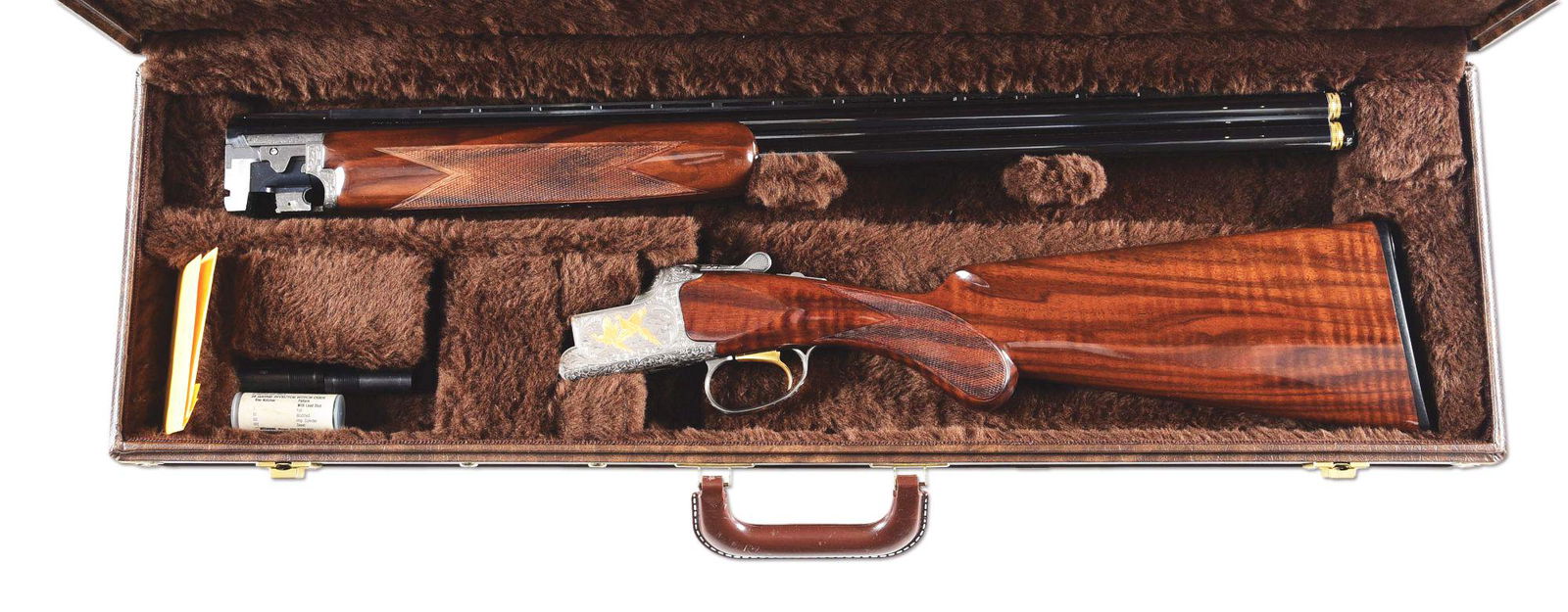 (M) BROWNING CITORI GRADE VI OVER UNDER SHOTGUN.: Browning Citori Model 725 Grade VI over/under shotgun made circa 2010 in Japan. Blued fluid steel barrels with ventilated rib, bead front sight and invector screw in chokes. Satin grey chisel engraved