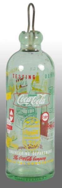 Coca-Cola Commemorative Hutchinson Bottle.: Description 1961. Nice and clean with just two chips at top of bottle. Includes stopper. Condition (8.5, Excellent). Size 7 - 1/2" T.