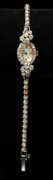 Antique 14K White Gold Diamond Watch.: Description By Bulova with 58 diamonds. Jewelry Condition (Excellent).