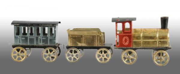 Tin Early French Train Set.: Description Includes locomotive, tender and one passenger car. Turn of the century piece with old wash wheels and marked "FSM" on sides of engine. Some pitting and wear to top of boiler on engine. Ver