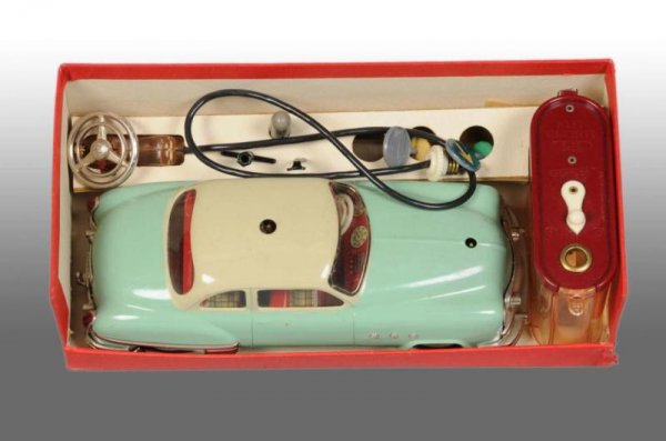 Schuco Elektro Ingenico 5311 Car Toy.: Description German. Appears to be complete and unused. Includes directions, cable in original plastic, battery holder, accessories and original box marked "DRGM". Condition (Near Mint). Size 5" x 10".