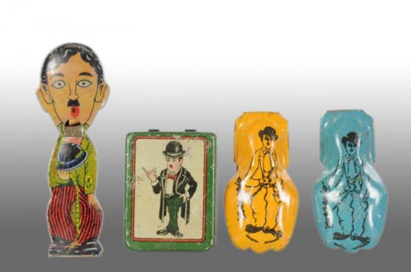 Lot of 4: Small Tin Charlie Chaplin Items.: Description Includes a rare lithographed tin cap bomb, small rectangular circa 1920. 1930s litho tin whistle from Japan. Two small 1920s or 1930s tin clickers unmarked, possibly from Spain. Collection