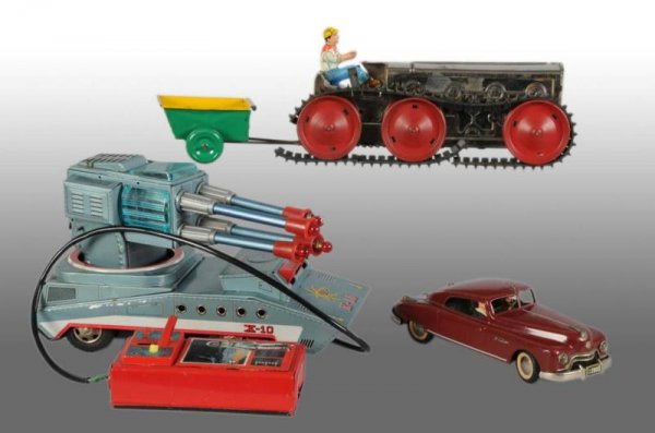 Lot of 3: Tin Battery & Wind-Up Toys.: Description All are working. Includes American Marx Tractor Trailer, German Arnold Touring Car and Japanese X-10 Space Vehicle. Tractor trailer has torn off but present original treads and lithographe