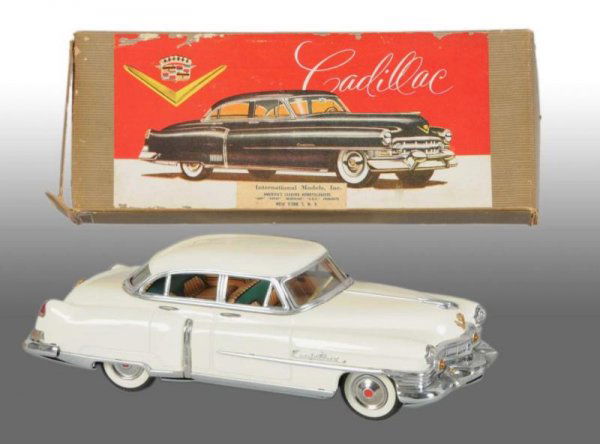 Tin Marusan Cadillac Friction Toy Car. Tin Marusan Cadillac Friction Toy Car.