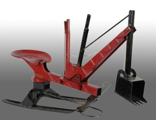 Pressed Steel Buddy L Giant Digger Toy.: Description Circa 1931 to 1932. Operator's seat, main frame, boom and control levers. This is an extraordinary example of one of the greatest sandbox toys ever made with just moderate overall play wea