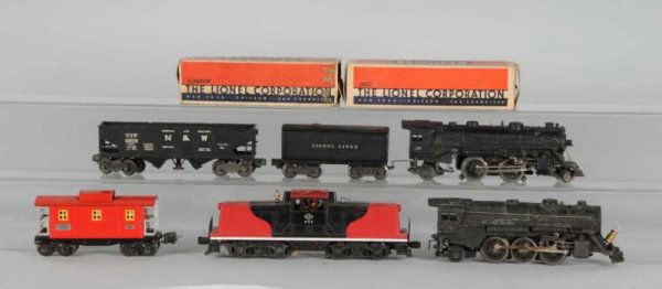 Lot of 8: Lionel Engines & Cars.: Description Post-war. Includes 625LV center cab engine, chassis for New Haven electric, 675 steam engine, 229 steam engine, Norfolk & Western operating gondola car 22000, 2689W whistling tender with o