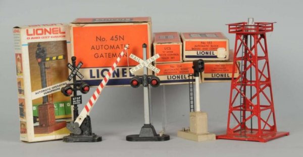Lot of Assorted Lionel Catalogs & Accessories.: Description Post-war. Includes towers, crossing gates, a pair of O-22 switches, two lamp posts, and 45N gateman. Some have their original boxes and alll are in good to very good condition. Post-war Tr