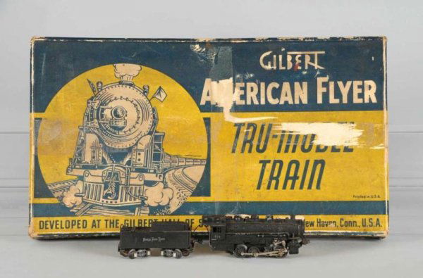 American Flyer S on O-Gauge Engine, Tender & Cars: Description Pre-war. Includes original set box copyright 1939 AC Gilbert Company. Includes 574 engine plus tender. Missing boiler front, and drive wheels are corroded, as usual. Also includes three ti