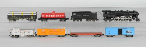 American Flyer 20530 S-Gauge Nighthawk Freight Se: Description Includes original box and individual boxes. Eight-piece set includes 21130 steam engine and tender, 24558 Christmas tree car with trees, 24316 Mobile gas tank, 24413 boxcar MP, 24633 caboo
