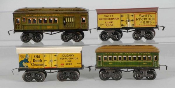 Lot of 4: Bing O-Gauge Passenger & Freight Cars.: Description Pre-war. Includes 4226 Old Dutch Cleanser car with restored roof, 7300 Swift's Premium Hams refrigerator car, 205 NYC passenger car, and 5285 longer NYC passenger car. Overall condition is