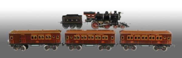 Bing Gauge-1 Cast Iron American Outline Train.: Description Pre-war. Circa 1912. Wheel arrangement 440 with Pennsylvania Rail Road tender and three Pennsylvania lines lithographed passenger cars numbered 1250 combination, 1207 pullman, and duplicat