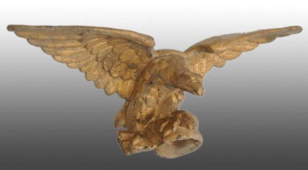 Cast Iron Eagle.: Description Large piece with 31-inch wingspan. Old gold paint. Small chip on lower jaw. Figural Cast Iron Condition (Excellent). Size 13" T.