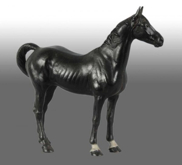 Cast Iron Horse Doorstop.: Description Full-figure. Hubley, cat. #345. Realistic black color. Figural Cast Iron Condition (Excellent). Size 10 - 3/4" x 11 - 1/2".