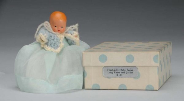 Rare Bisque Nancy Ann Storybook Baby Doll.: Description American, 1940s. #212 Hush-A-Bye Baby Series Long Dress and Jacket, incised "Story Book Doll". Has molded hair, painted features, jointed shoulders and hips, and star hand. Wearing origina