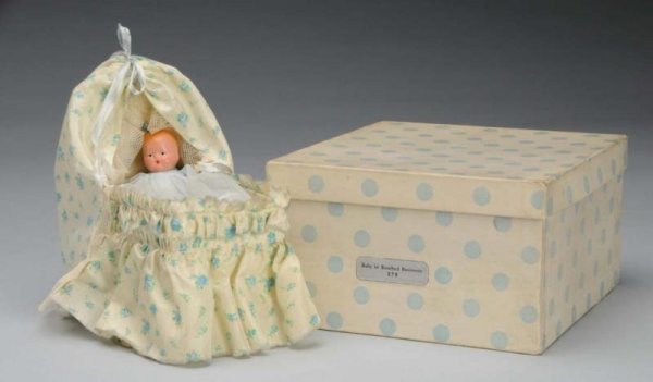 Rare Bisque Nancy Ann Storybook Baby Doll.: Description American, 1940s. #279 Baby in Rosebud Bassinette, incised "Story Book Doll". Has molded hair, painted features, jointed shoulders and hips, and star hand. Wearing original baby gown, slip,