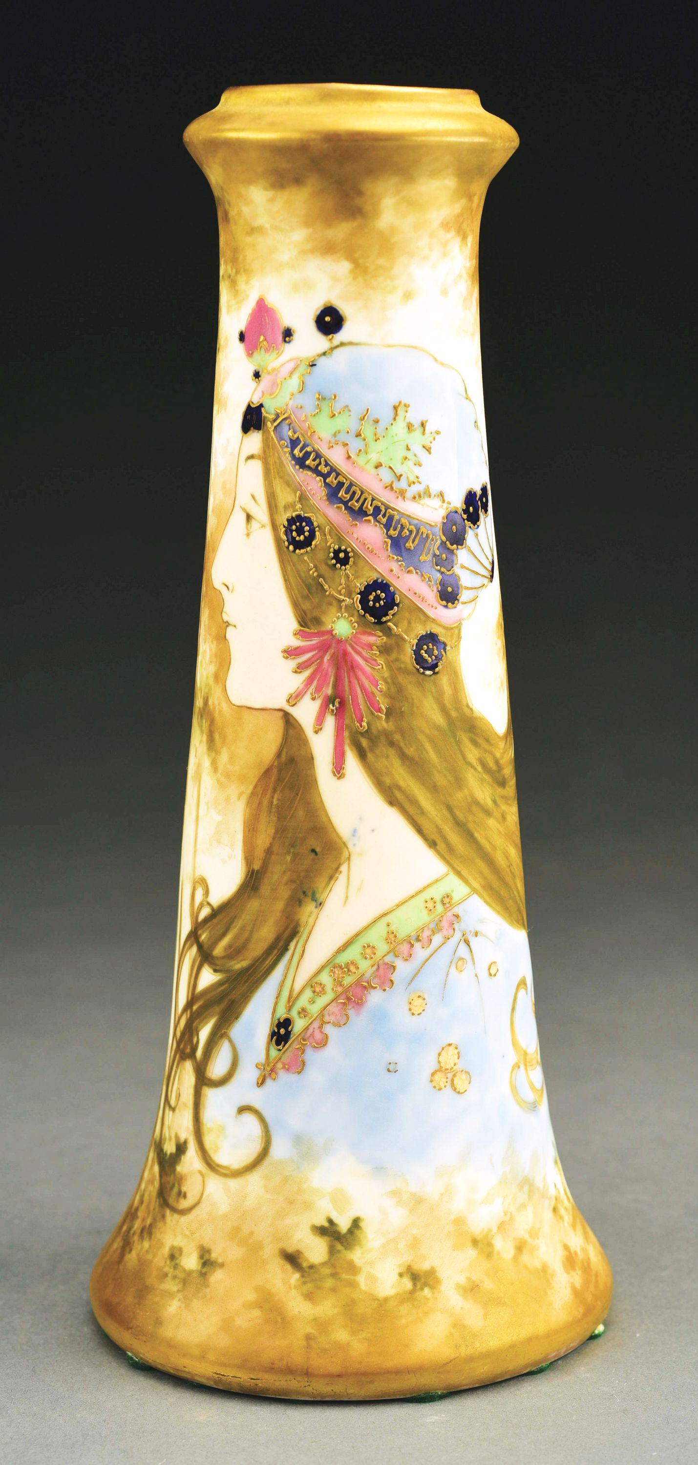 AMPHORA GYPSY GIRL PORTRAIT VASE.: Matte and high-fired glazes with applied enameling. RSTK mark, Amphora Oval mark, impressed "634-26". 10 - 1/2" high. Illustrated in Monsters and Maidens: Collectors Edition, Vreeland, p. 111. Conditi