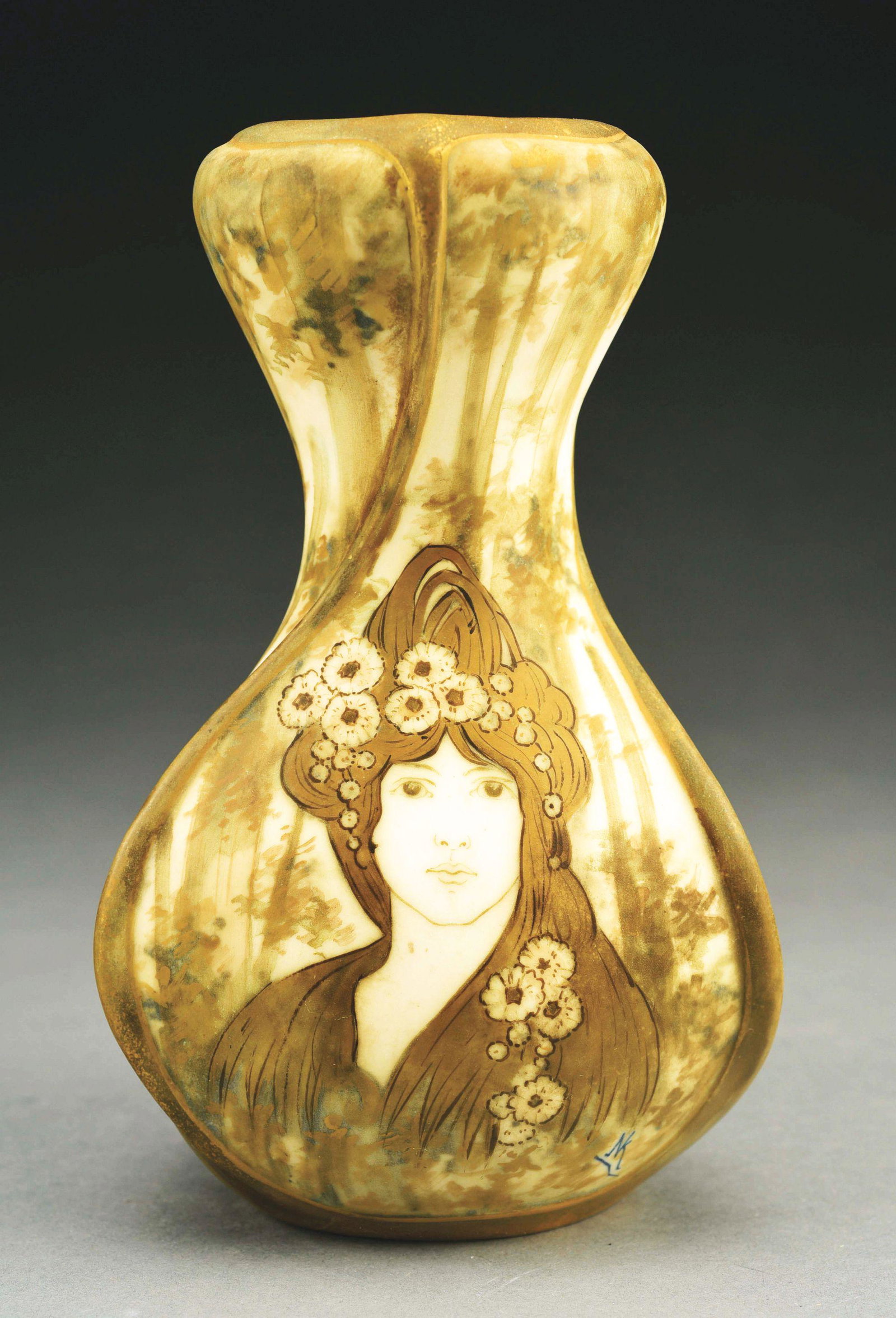 AMPHORA PORTRAIT VASE.: Matte finish, twisted top. Painted on body of the vase "NK" (Nicholas Kanhausser). Amphora Turn mark, RSTK mark, Amphora Oval, impressed numbers "37-21". 8 -1/4" high. Illustrated in Monsters and Maid
