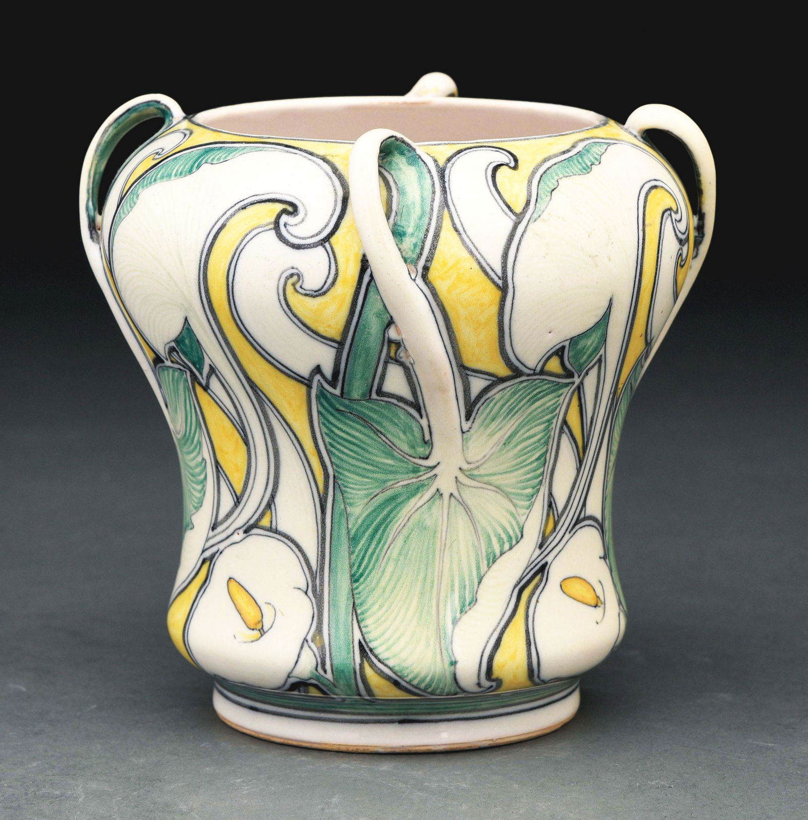 GALILEO CHINI ART NOUVEAU VASE.: Beautiful vase with calla lily design. Four small handles. Comes with Galileo Chini stamp under base. Condition: (Excellent). Dimensions: 5 - 1/2" T x 5 - 1/2" D.