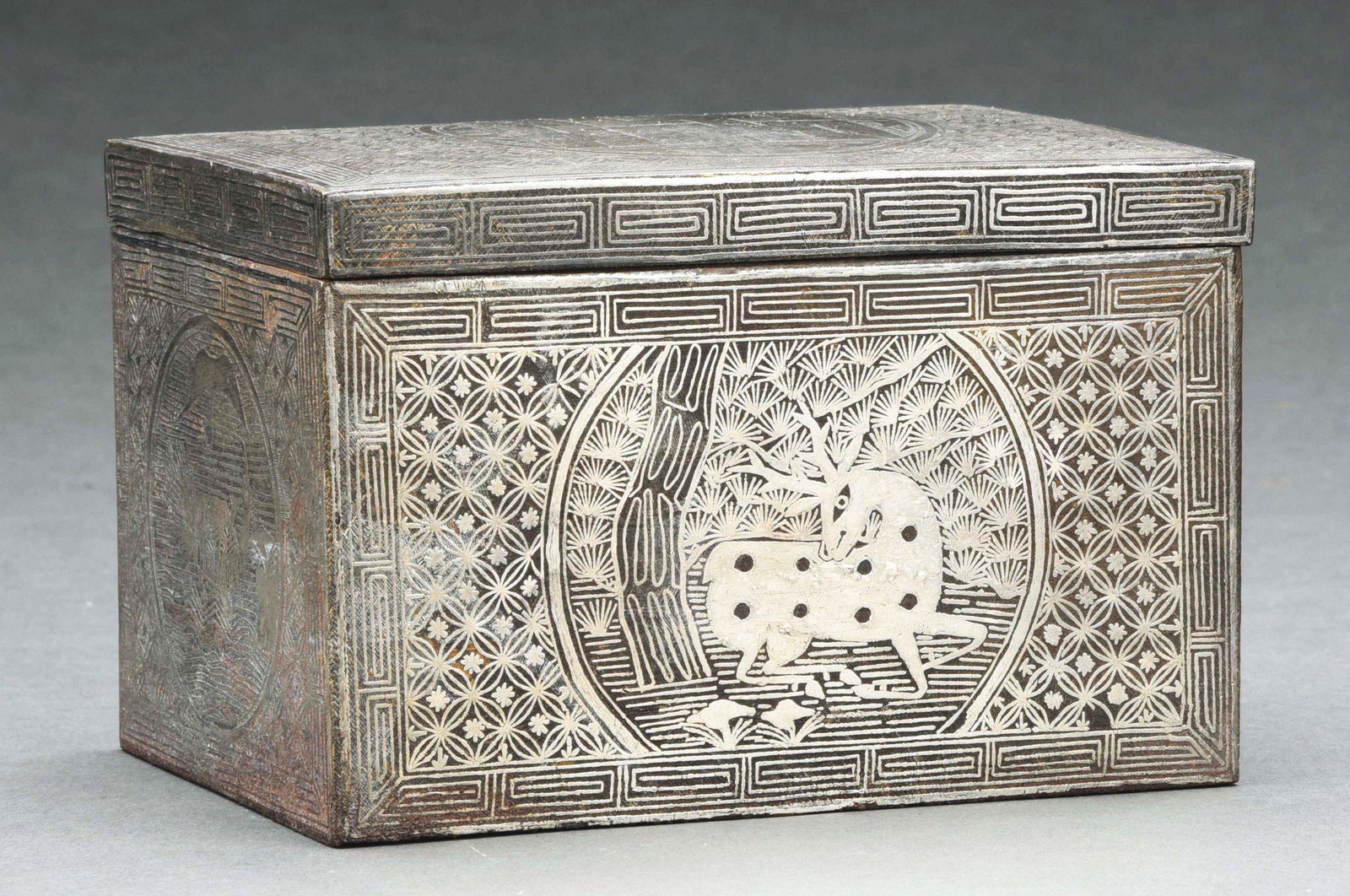 KOREAN SILVER DECORATED BOX.: This box tests for sterling silver. Intricately carved and stenciled box with animal scene. 18th century. Condition: (Excellent). Dimensions: 3 - 1/2" x 5 - 3/8" x 3 - 5/8".