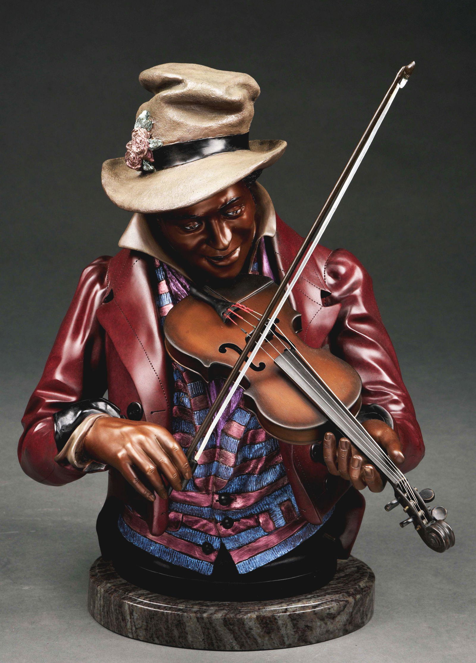 20TH CENTURY COLD-PAINTED BRONZE NEW ORLEANS JAZZ: Beautiful 20th century American bronze, signed "A. Matthews" and numbered "43/88". A beautiful figure of an American musician playing fiddle, mounted upon a grey marble base. Fantastic expression and