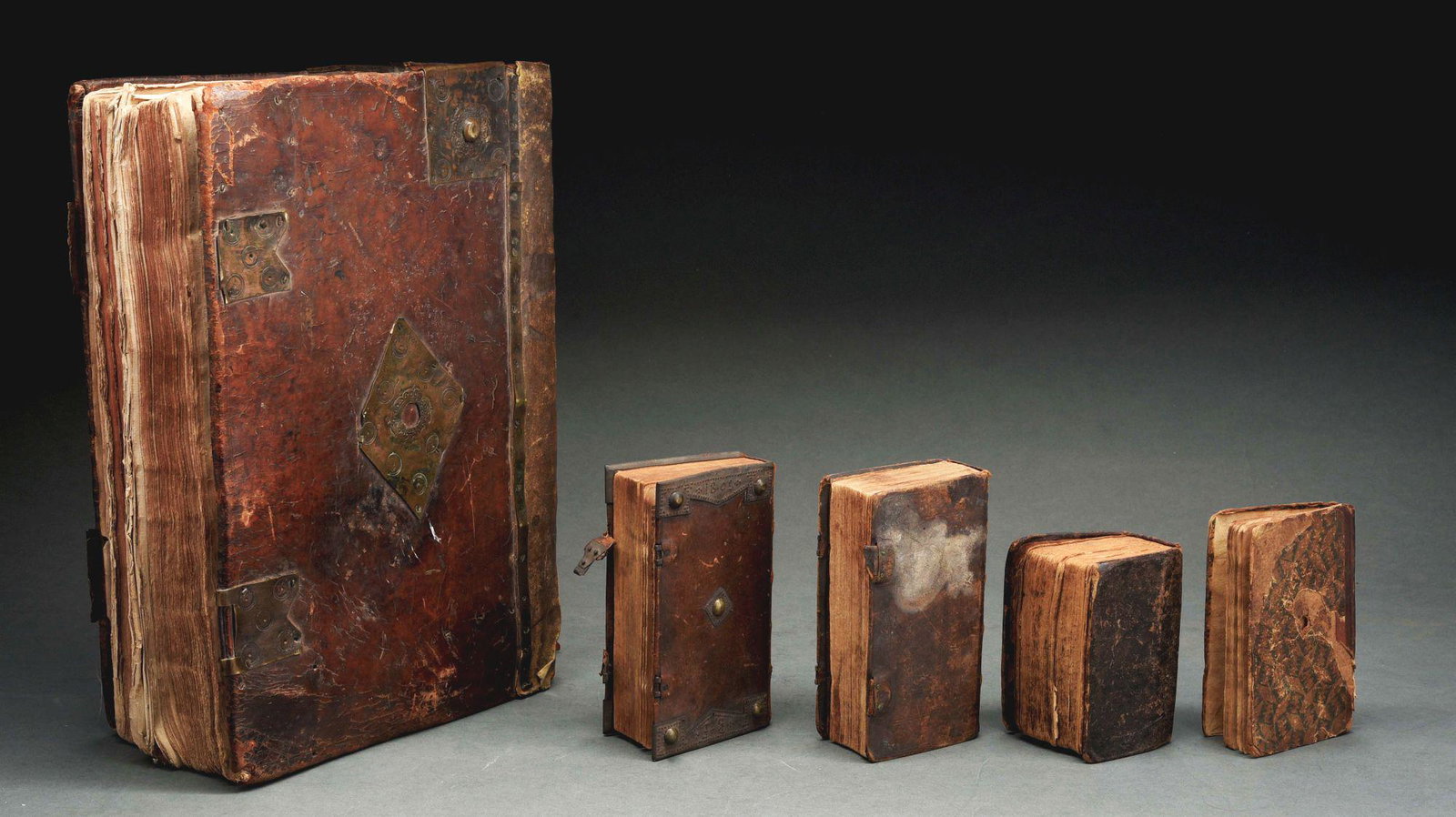 LOT OF 5: ANTIQUE BOOKS.: Psalter published by Christoph Sauer, 1764; Psalter published in 1812 in Pittsburgh, PA; Catechism book published 1831; Psalter dated 1797 and large early London Bible circa 1613, missing title page. 