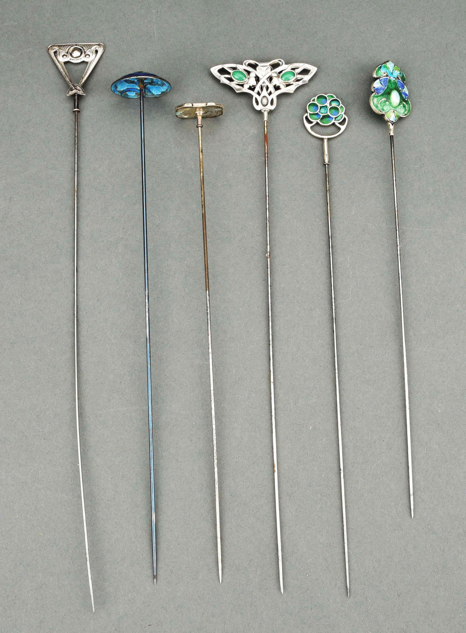 LOT OF 6: CHARLES HORNER HAT PINS.: Lot of six c. 1900's Charles Horner hat pins with jewels and enamel work, no damage. 8" - 10" tall. Condition: (Excellent). Dimensions: Display Box: 12 - 1/4" x 8 - 1/4".