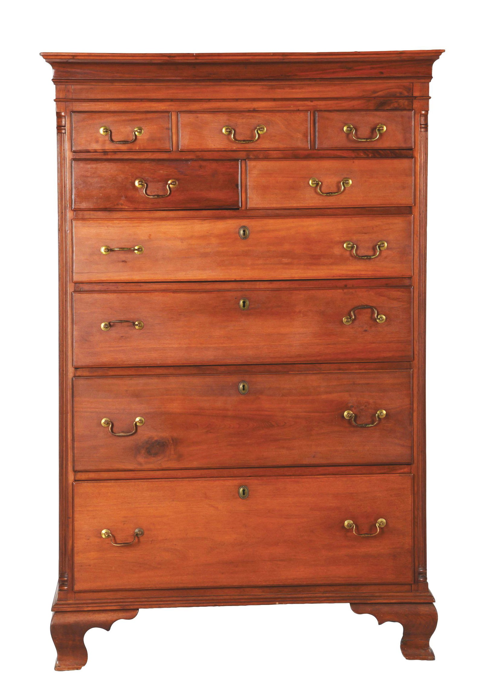 CHIPPENDALE HIGH CHEST.: Walnut and poplar, c. 1800, western Pennsylvania. Three drawers over two drawers over four drawers. Fluted corner columns, ogee feet, original brass. Minor repairs to drawer lips, several glue blocks 