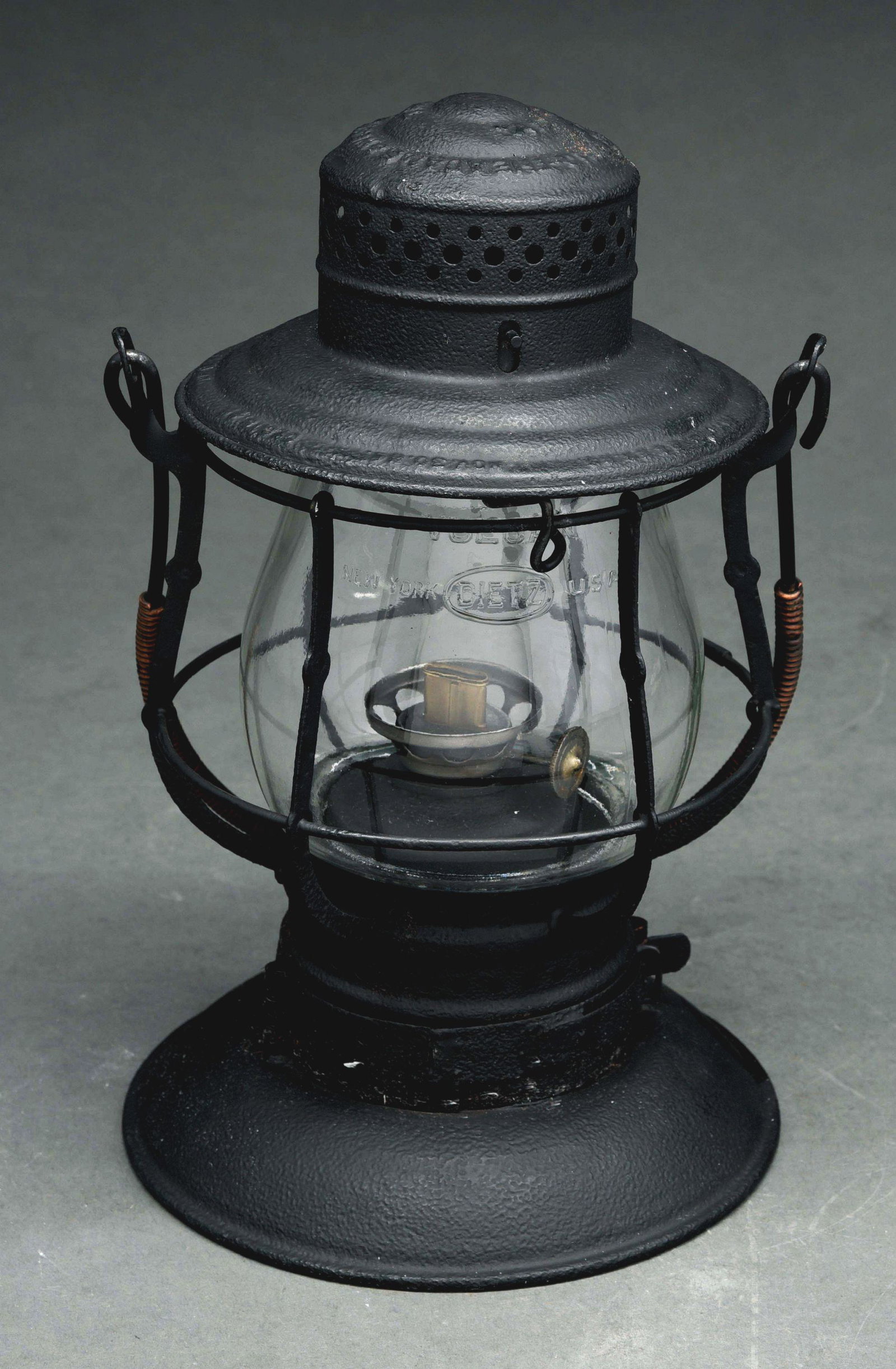 D & L.N. R-Y ADAME & WESTLAKE NO. 39 STEEL GUARD: Scarce Detroit & Lima Northern single guard example, painted black with copper bail wrap. The base fits well and has a No. 1 ratchet burner that is not correct for this lantern. There are several cond